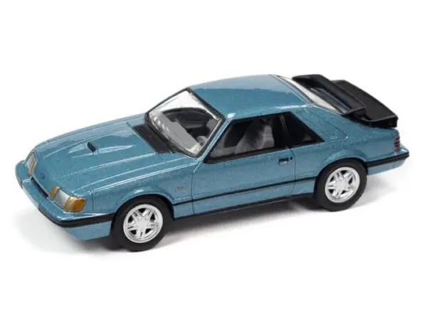 jlsp247a1 - 1986 FORD MUSTANG SVO (LIGHT REGATTA BLUE METALLIC) - JOHNNY LIGHTNING CLASSIC GOLD