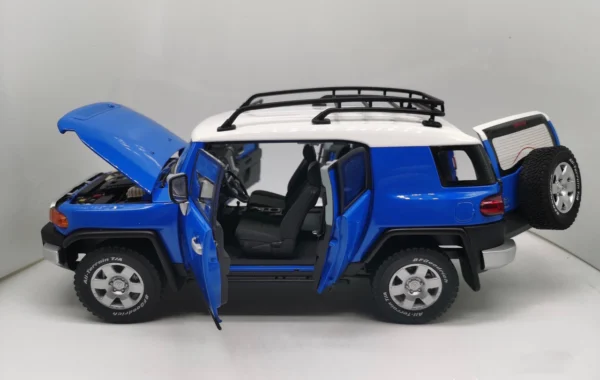TOYOTA FJ CRUISER - BLUE W/WHITE ROOF AND RACK BY AUTOART