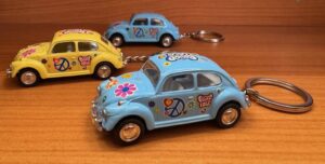 1967 VOLKSWAGEN BEETLE KEY RING - WITH PEACE LOVE GRAPHICS (2 BLUE AND 1 YELLOW)